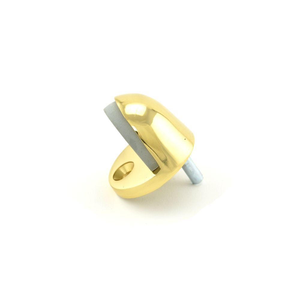 Trimco 1211605 Cast Universal Dome Stop with Low Rise Lip and High Rise Rubber Bright Brass Finish Main image
