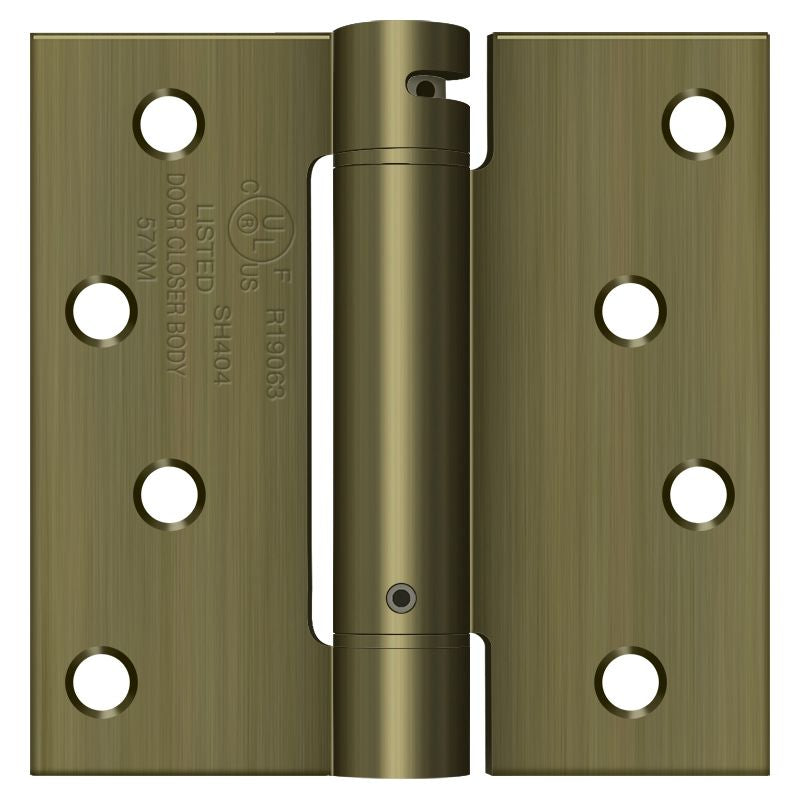 Deltana DSH44U5 4" x 4" Spring Hinge; Antique Brass Finish Main image