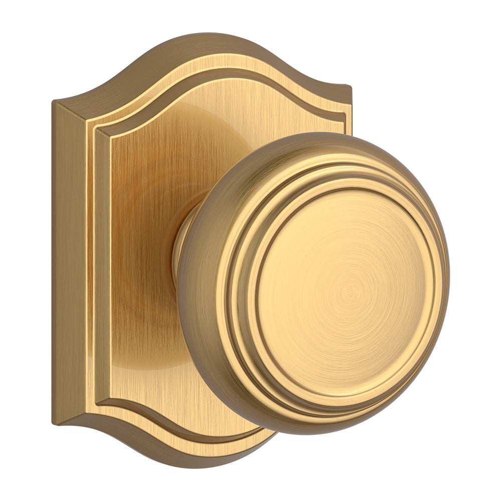 Baldwin Reserve PSTRATAR044 Passage Traditional Knob and Traditional Arch Rose with 6AL Latch and Dual Strike Lifetime Satin Brass Finish